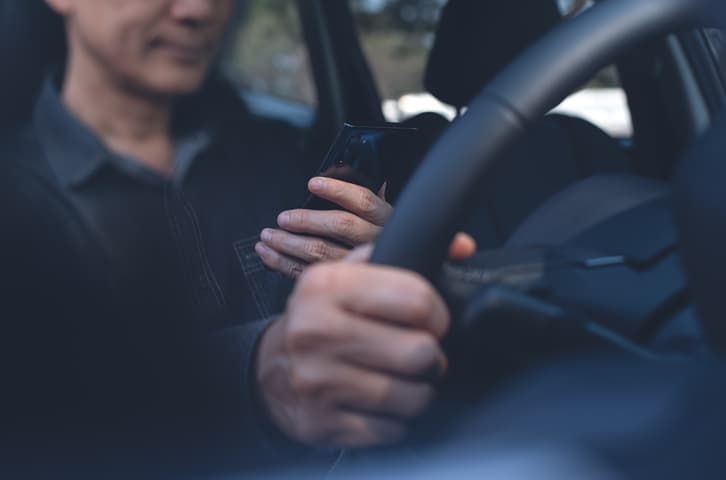 Are walkie talkies legal while driving?